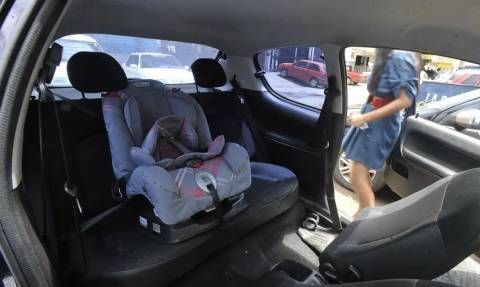 Melhor lugar de criança no carro é o meio do banco de trás